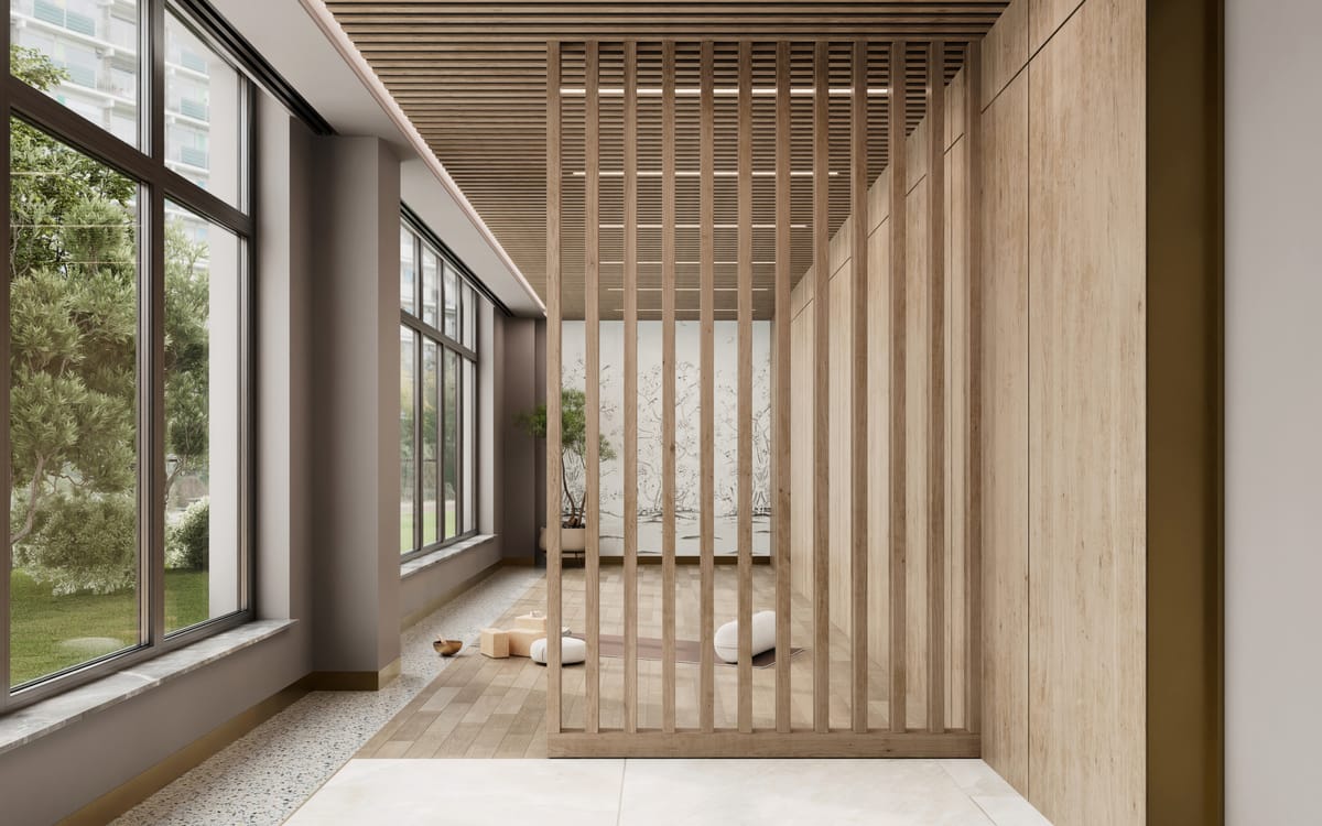 A calm yoga studio with a cushioned floor and soft natural light